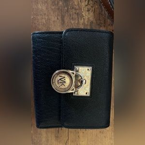 Black Michael Kohrs wallet.